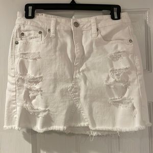 White jean skirt with rips